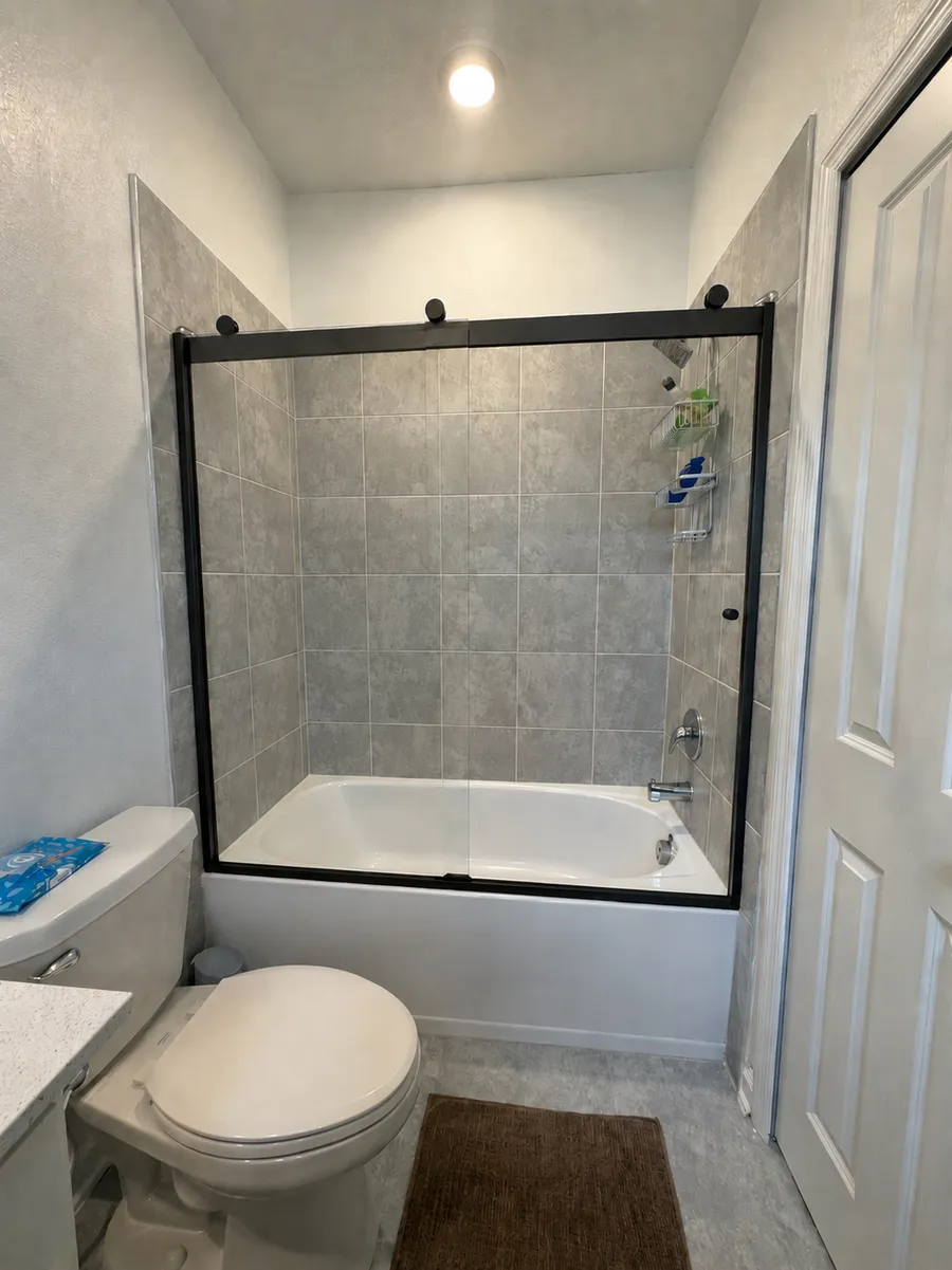 After: framed glass tub enclosure in Kissimmee